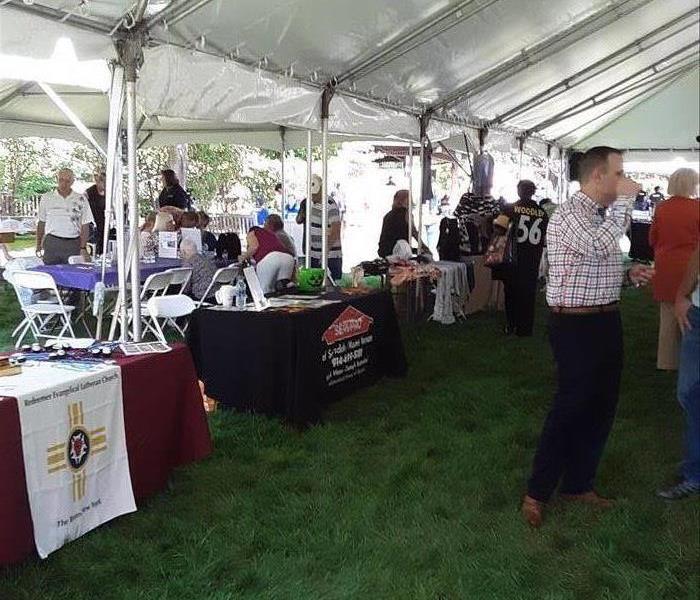 several booths set up at an outdoor event