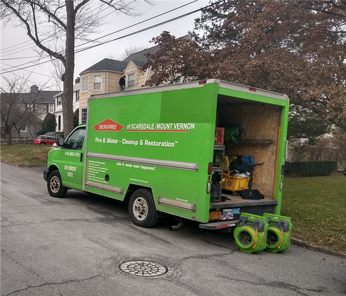 a green SERVPRO truck