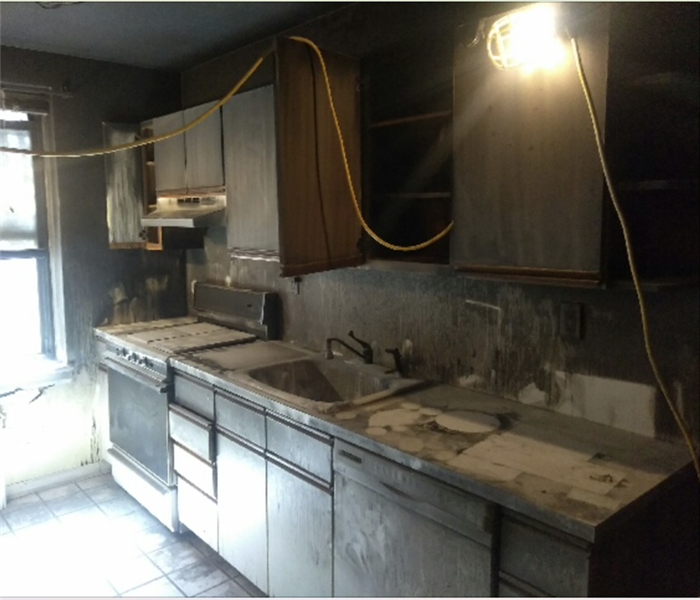 Fire damaged kitchen.