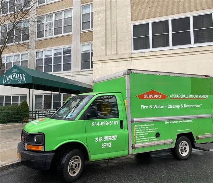 truck in front of apartment building